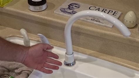 moen kitchen faucet leaking from base of spout|How to Fix a Leaking Moen Kitchen Faucet